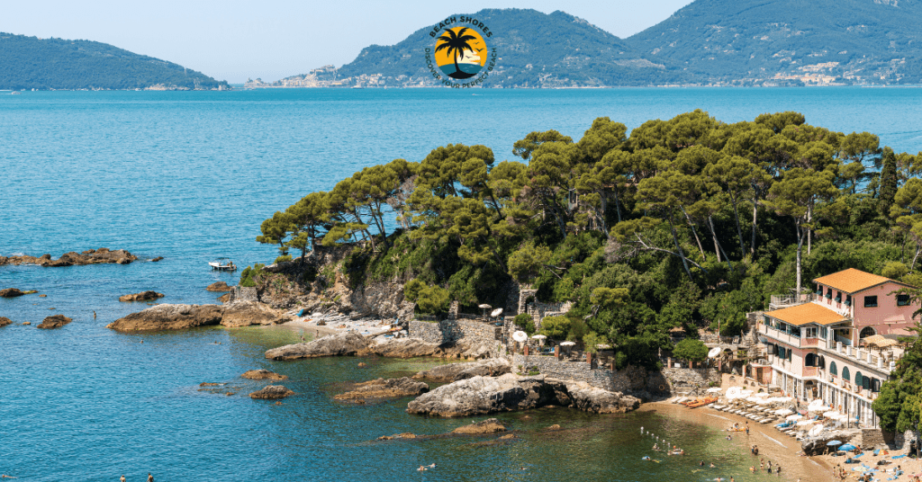 Baia Blu Beach near La Spezia beaches with clear waters and lush Mediterranean vegetation.