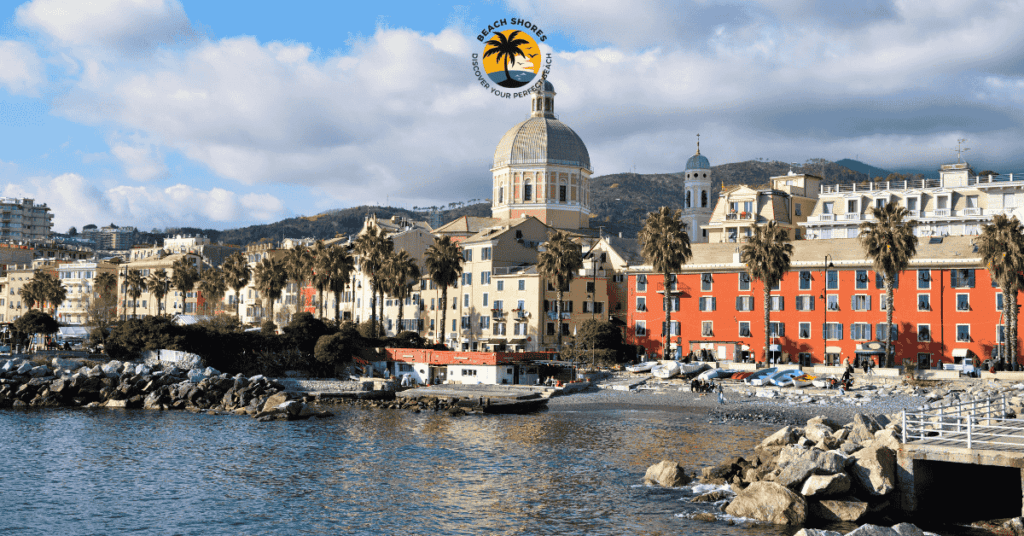 a beach with buildings and palm trees