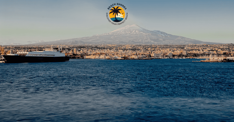 Breathtaking view of Catania beaches with crystal-clear waters and Mount Etna in the background.