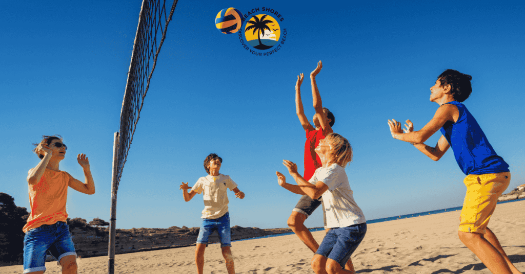 a group of people playing volleyball on a beach